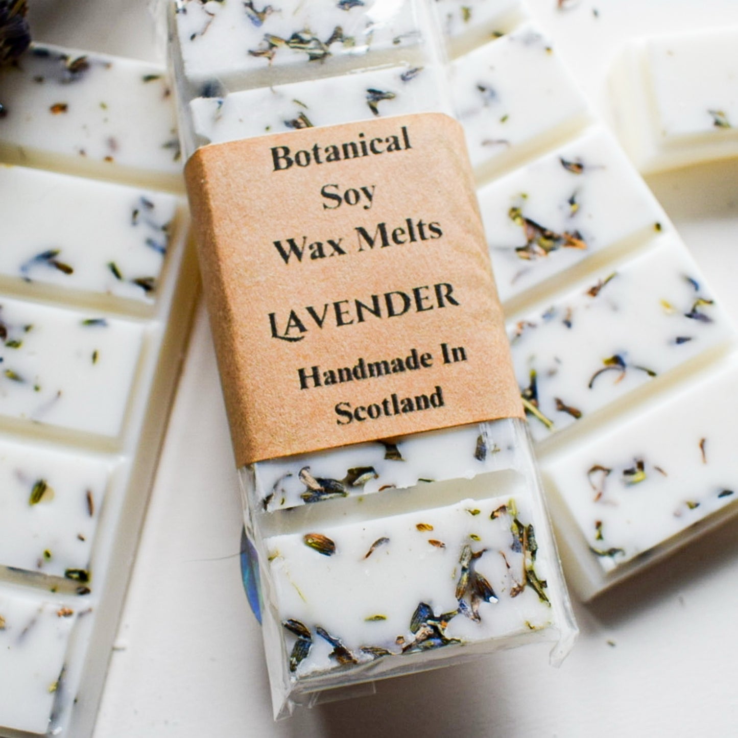 Botanical soy wax melts with lavender scent, handmade in Scotland, on a white background.