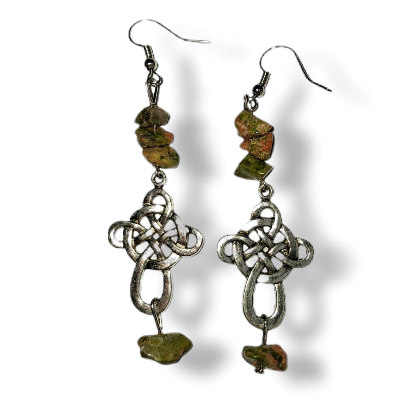 Celtic knot earrings with green stone beads on a white background
