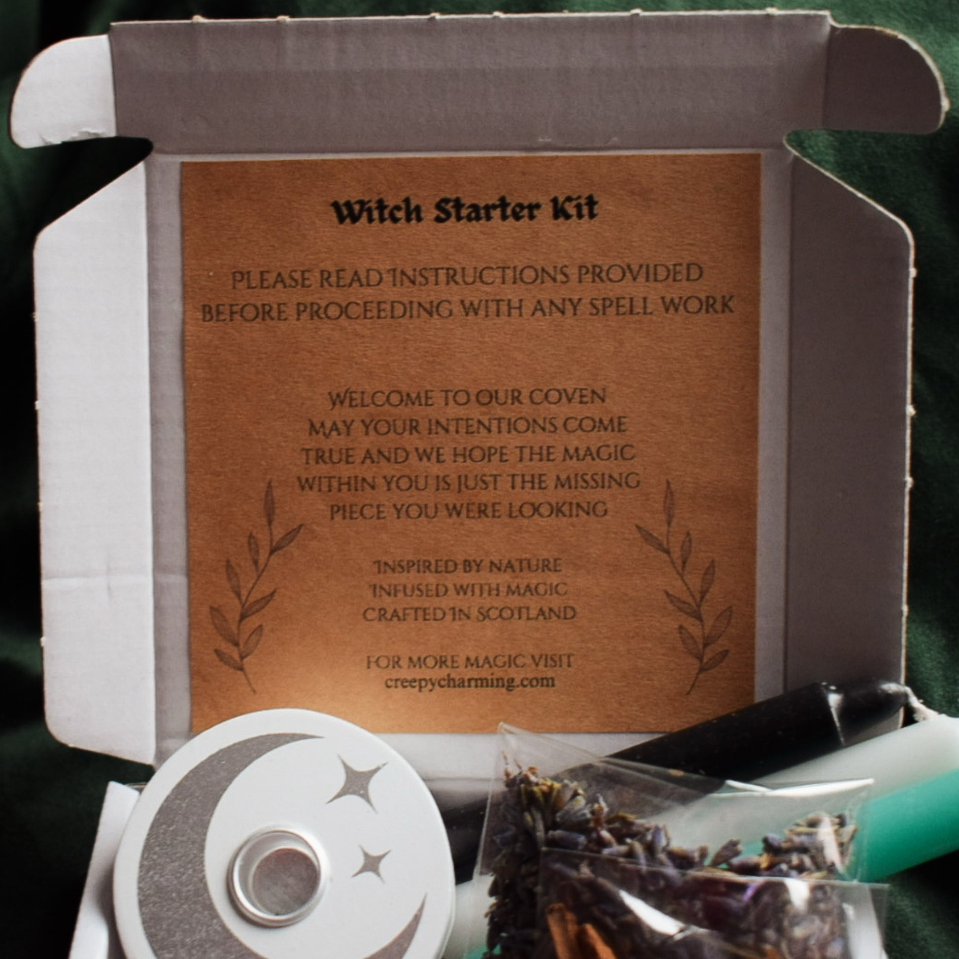Witch Starter Kit with instructions on a dark background
