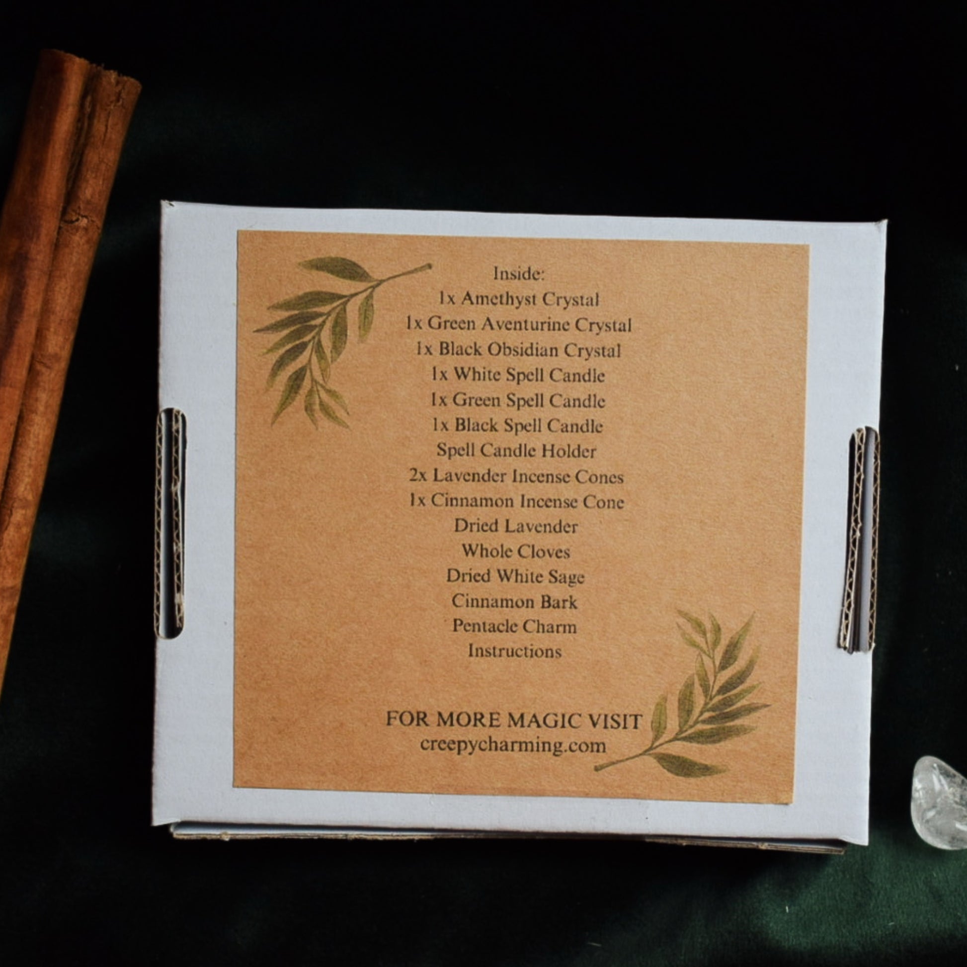 Box with spell ingredients list and branding on a dark background