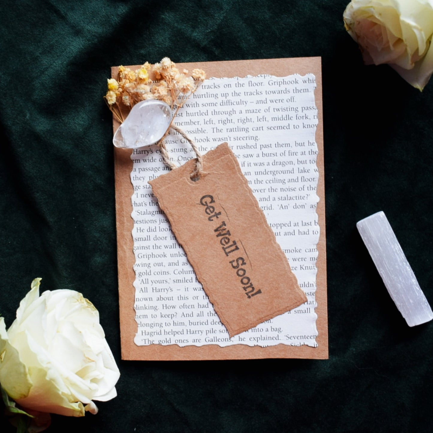 Get Well Soon card with decorative elements on a dark fabric background