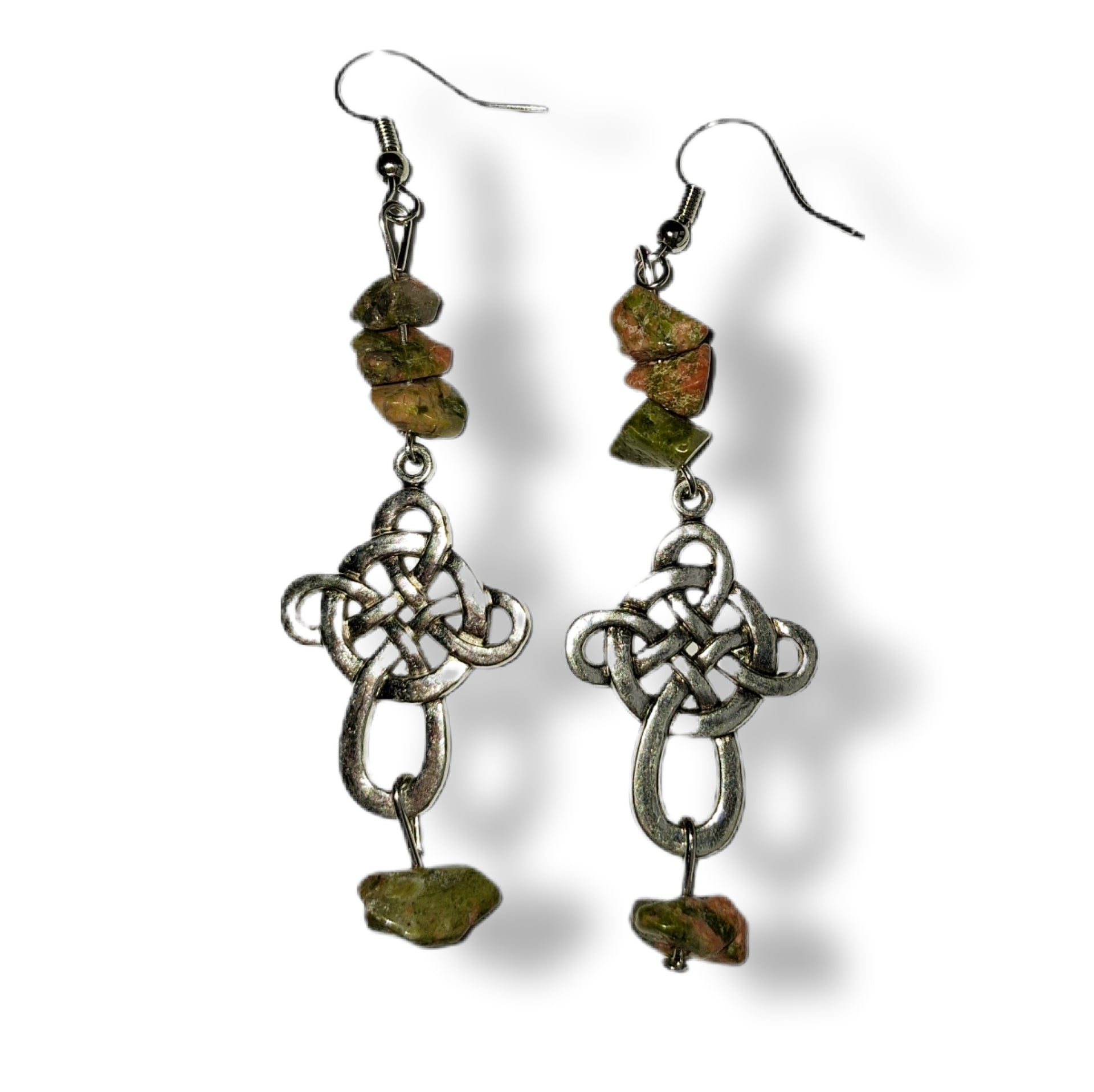 Celtic knot earrings with green stone beads on a white background